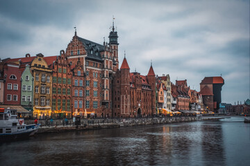 Fototapeta premium Gdansk old town and famous crane in cloudy day. Gdansk, Poland. November 2021