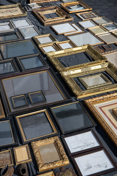 Tongeren. Belgium. Fleamarket. Brocante. Secondhand market. Outdoors. Collections of frames and mirrors.