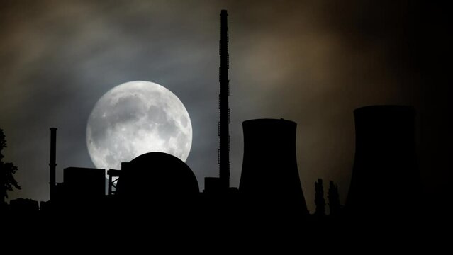 Philippsburg: Nuclear power station, Time Lapse by Night with Full Moon and Cooling towers in Silhouette, Germany