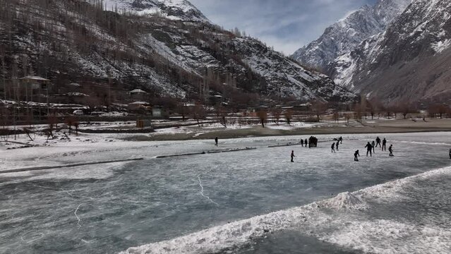 Landscape of lake with mountains. Khalti Lake Gilgit Northern Area of Pakistan winter. 