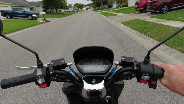 first person view of driving an electric moped