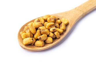 Fried corn in a spoon isolated over white background