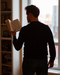 man holding a book