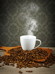 Naklejka premium cup of coffee with beans