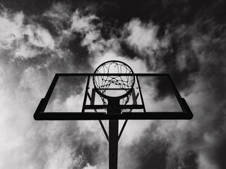 basketball hoop on sky clouds background.