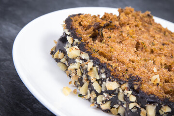 Pieces of zucchini dough with nuts and raisins