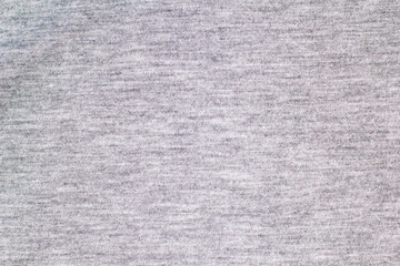 Grey knitted fabric cotton textured background. Closeup with copy space for your design