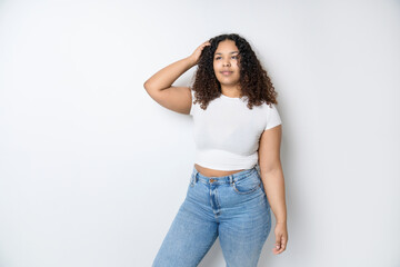 Studio portrait of beautiful brunette young dark-skinned woman
