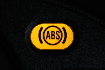 Warning light of the anti-lock braking system -ABS on the dashboard of the car. - obrazy, fototapety, plakaty