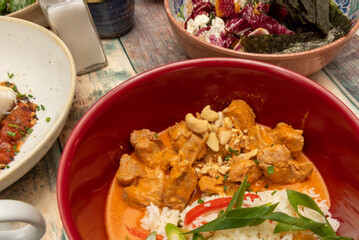 Red Curry is a very popular curry in Thai cuisine based on the use of heated coconut milk with red curry paste and fish sauce