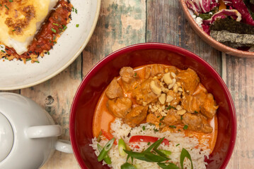 Red Curry Various meat contents are often added to the mix, as well as Thai basil. There are versions of this sauce for pescetarians.