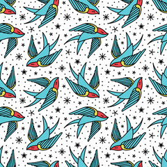 seamless pattern with swallows in the style of an old-school tattoo. Vector illustration