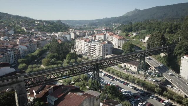Aerial of Redondela city with the train bridge on a sunny summer day in Pontevedra, Galicia