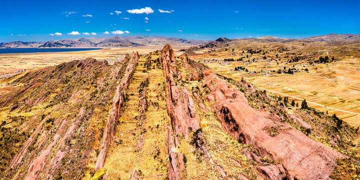 Flight above rock formations in Aramu Muru near Puno in Peru