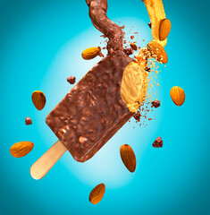 Almond ice cream stick, almonds around, blue background - obrazy, fototapety, plakaty