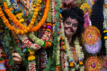 Kolkata, India - October 17, 2018 : The cruel face of Asura idol, the demon, who was killed by Goddess Durga. Durga Puja is biggest religious festival of Hinduism, celebrated all over the world.