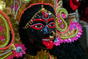 Kolkata, West Bengal, India - 7th October 2018: Painted idol of Goddess Kali with black face and...