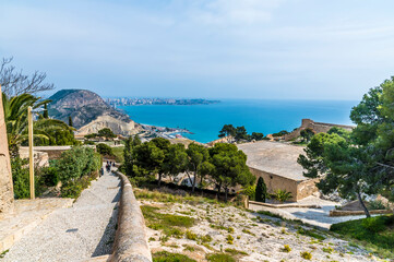 A view down a pathway in the castle of Saint Ferran above Alicante on a spring day