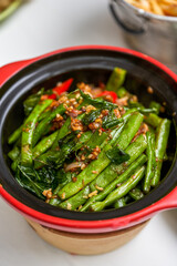 A pot of dry fragrant and delicious dry stir-fried green beans