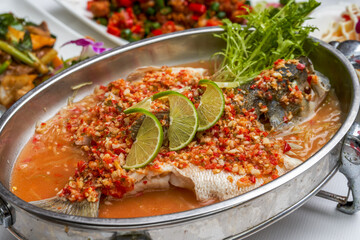 A Spicy Sea Bass with Chopped Peppers in Thai Sauce