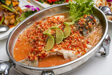 A Spicy Sea Bass with Chopped Peppers in Thai Sauce
