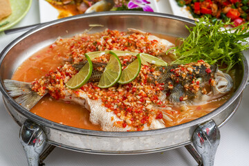 A Spicy Sea Bass with Chopped Peppers in Thai Sauce