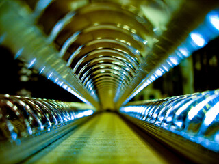 Futuristic metallic sci-fi tunnel with fractal structure in macro towards the vanishing point....