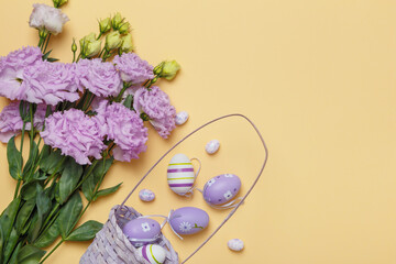 Easter eggs basket bouquet of purple flowers on a yellow background with copy space.