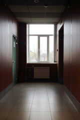 corridor in an office building on a sunny day