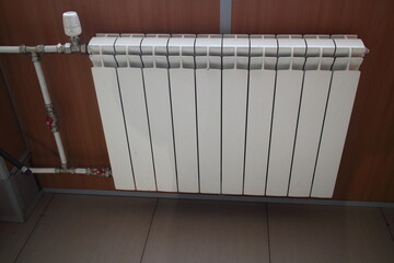 heating radiator on the wall in an office building
