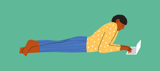 Male character lying down working on laptop. Man in pajamas relaxing on floor browsing internet, chatting social media, writing, shopping online. Work at home, freelance. Lifestyle vector illustration © OlgaStrelnikova