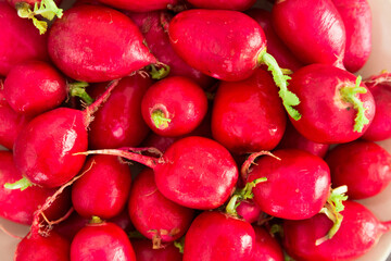 appetizing crispy radishes on wooden table