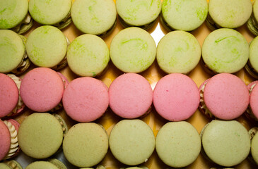 Fototapeta na wymiar collection of colorful French macarons are next to each other on a white background