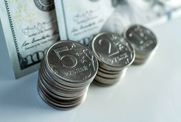 Russian rouble coin on banknotes of dollars. Concept of currency exchange. Decline of the world...