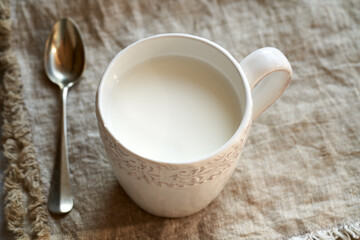 Probiotic kefir in a white cup on a table