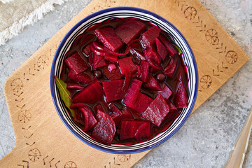 Fermented sliced red beetroot with spices - beet kvass