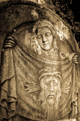 beautiful historic relief at a cemetery
