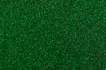 solid color emerald glitter background with depth of field, background with sparkles and glitters,...