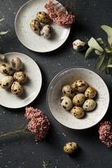 Quail eggs with beautiful pink dried flowers