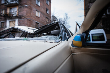 Burnt car after being hit by a rocket in Kyiv