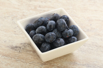 Sweet ripe blueberry heap in the bowl