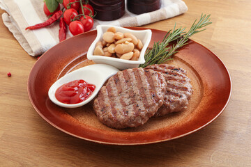 Grilled beef burger cutlet with sauce