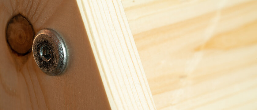 Wooden background with bolt fastening background.