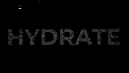 Text hydrate printed on the wet glass on black background | hydrating concept