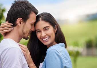 Obraz premium Lovetheres no greater feeling. Cropped shot of an affectionate young couple embracing while standing outdoors.