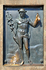 Bronze high relief image of the antique god of commerce, merchants and travelers Hermes - Mercury...