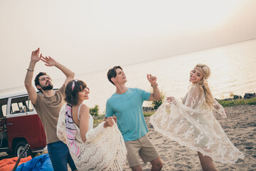 Photo of friends buddies enjoy vacation fun dance clubbing wear boho outfit nature seaside beach...