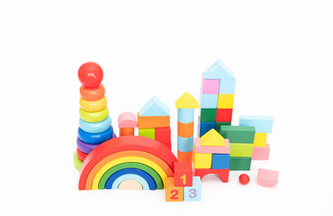 Children's toy wooden and colourfull toy shop isolated on white background. Educational toys.