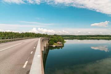 Sweden, Loftahammar, Empty coastal road and calm sea sky