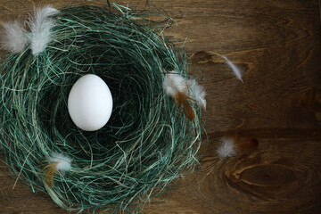 Organic chicken eggs on the kitchen table for cooking. Easter eggs on a wooden background.